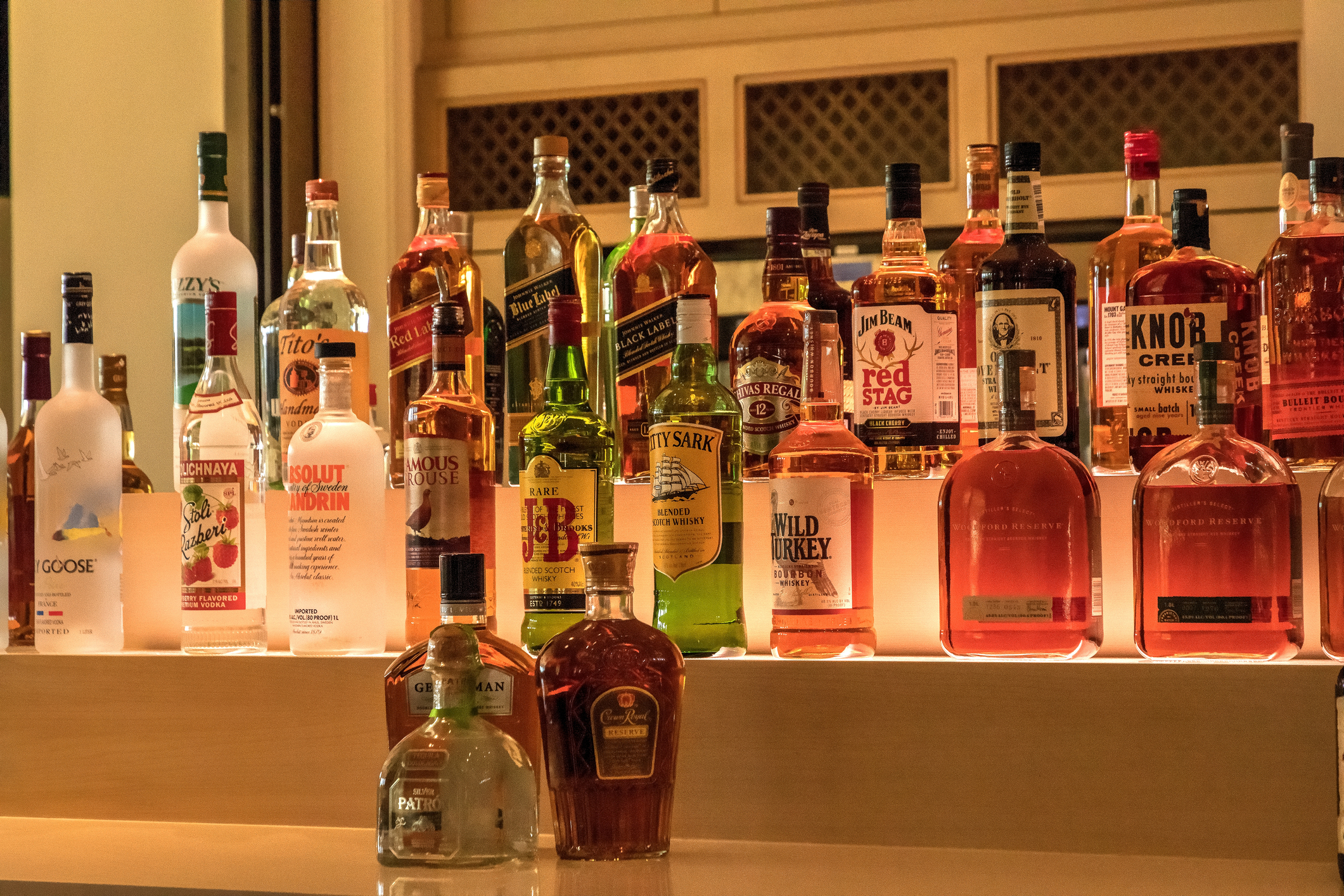 bottles of liquor on back bar