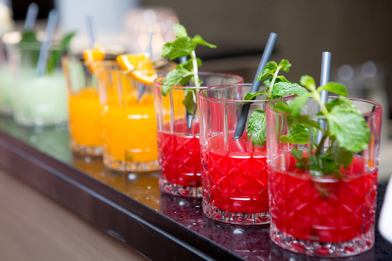 many glasses of fruit juice cocktail