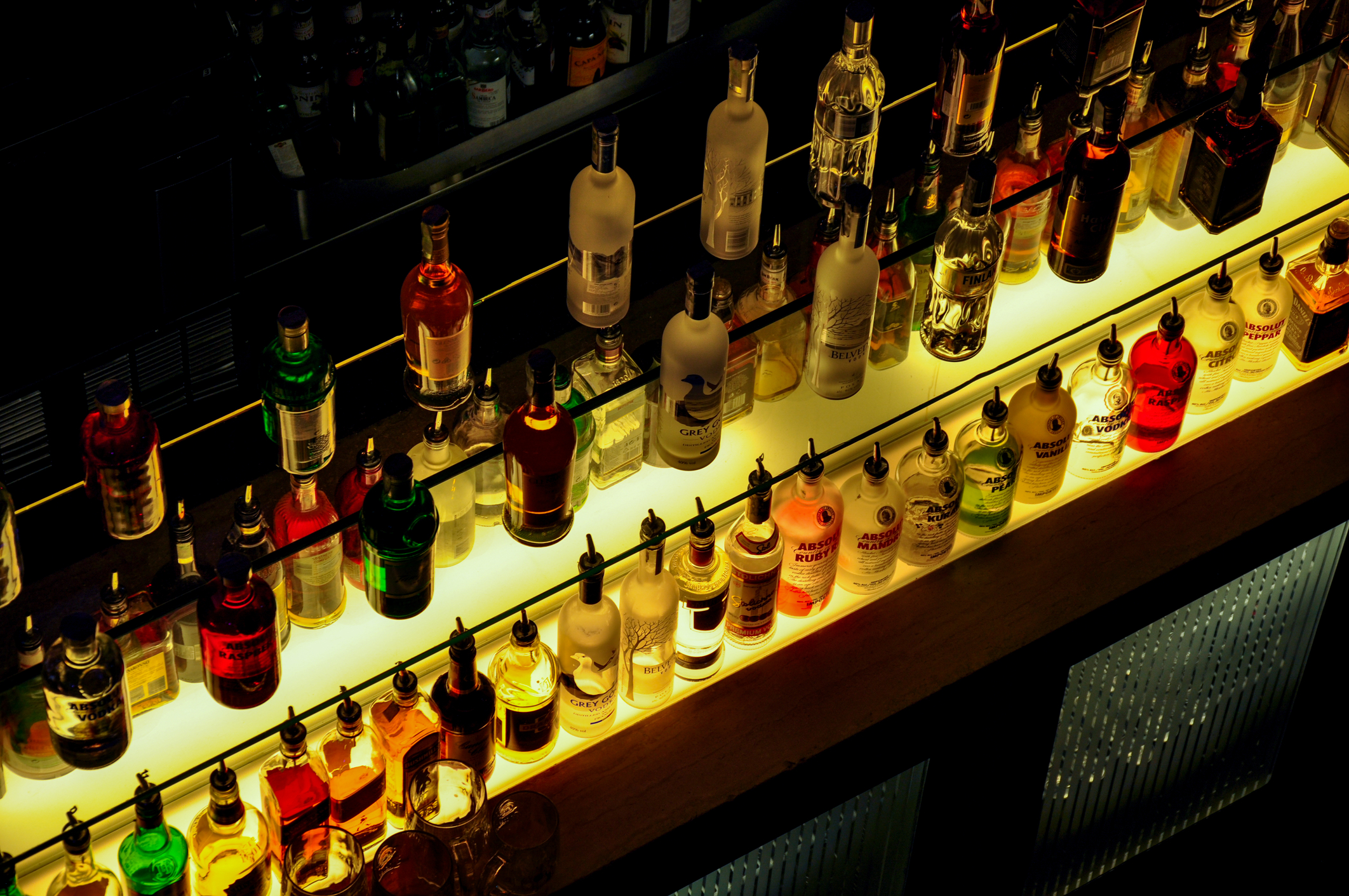 overhead view of bottles on back bar