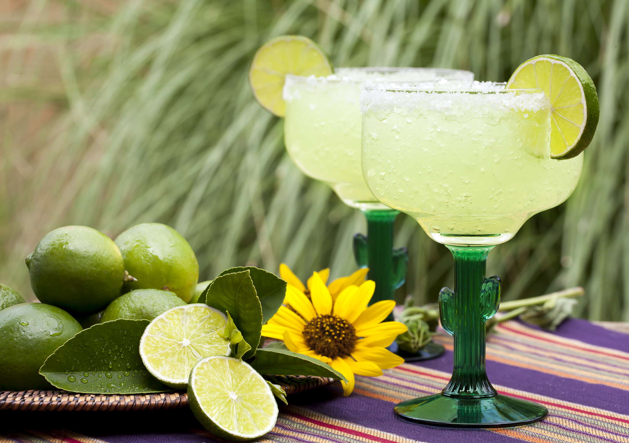 salted margaritas with limes