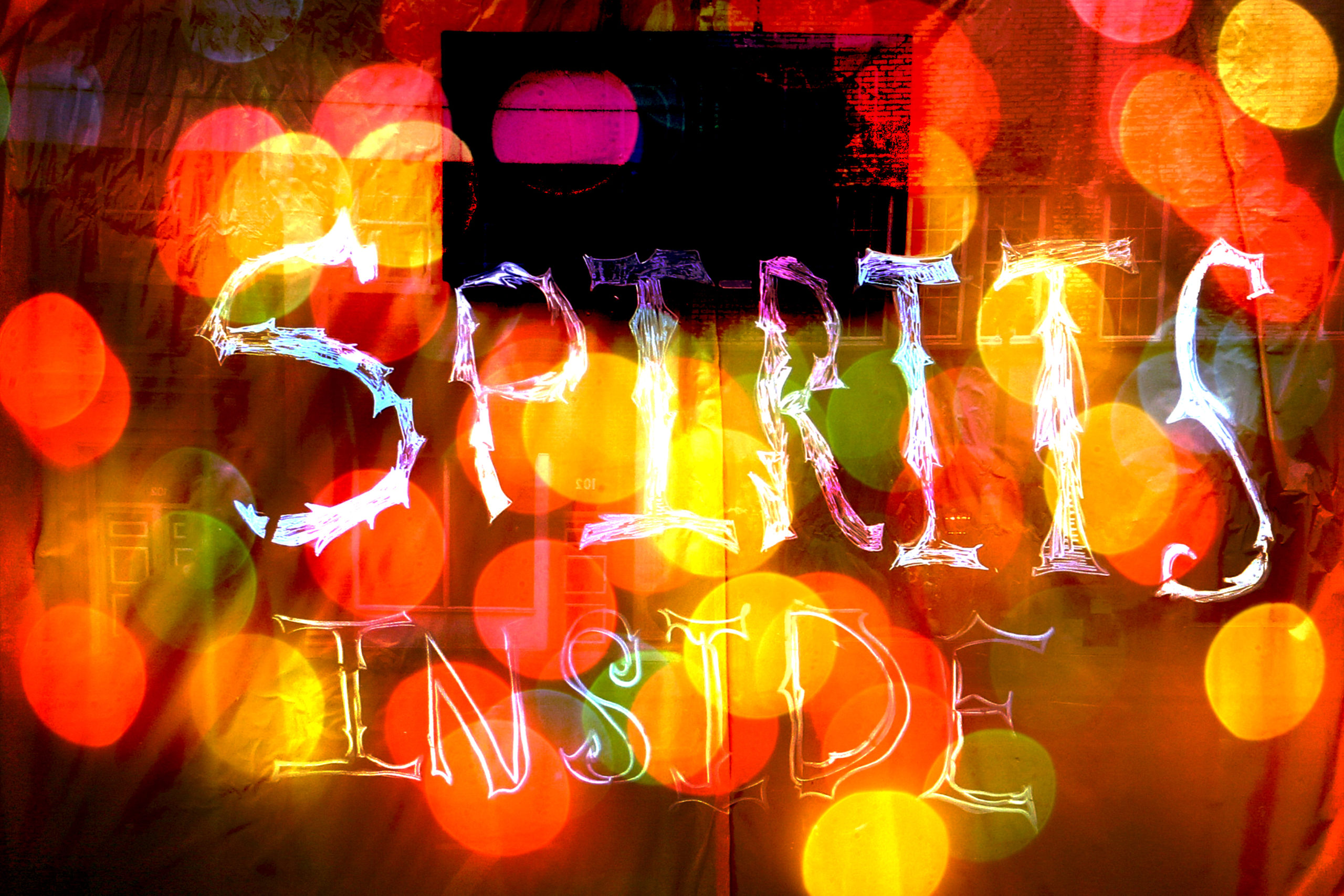 word spirits with blurred lights